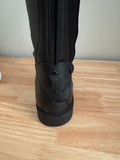 Tuffa Stellar boots one off.